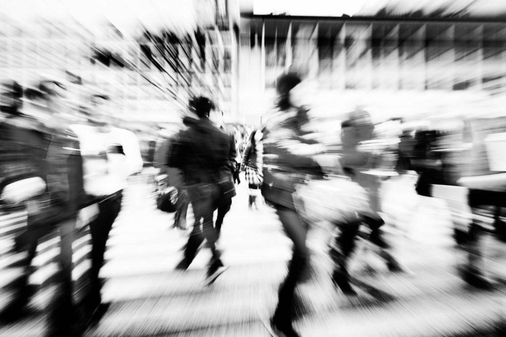 a blurred image of a crowded street to show the unthinkables